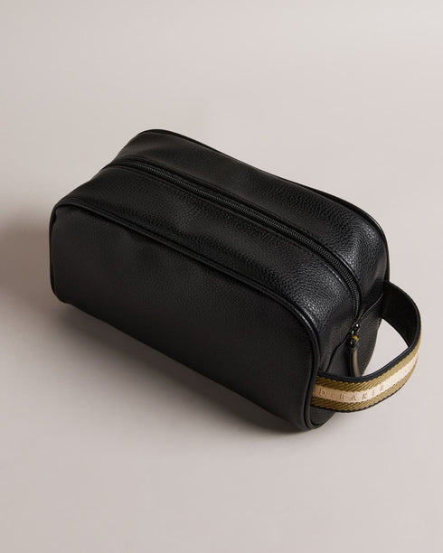 KAIIRO-Gifts-Your Toiletries Can Travel In Style Too. With Its Sleek Design And Smooth Leather Kaiiro Is A First-class Ticket For Your Personal Items. The Zip Fastening Keeps Everything Secure While The Spacious Interior Offers Plenty Of Room For Your Essentials. Washbag Faux leather Branded webbing handle Zip fastening Debossed logo Dimensions: 13cm x 25cm x 11cm- Ted Baker Romania